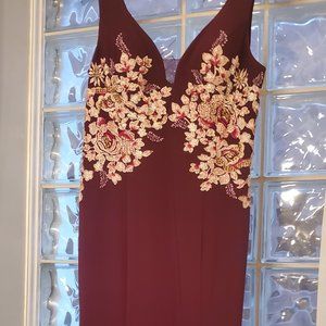 Xscape burgundy mermaid gown with embellished appliques sides